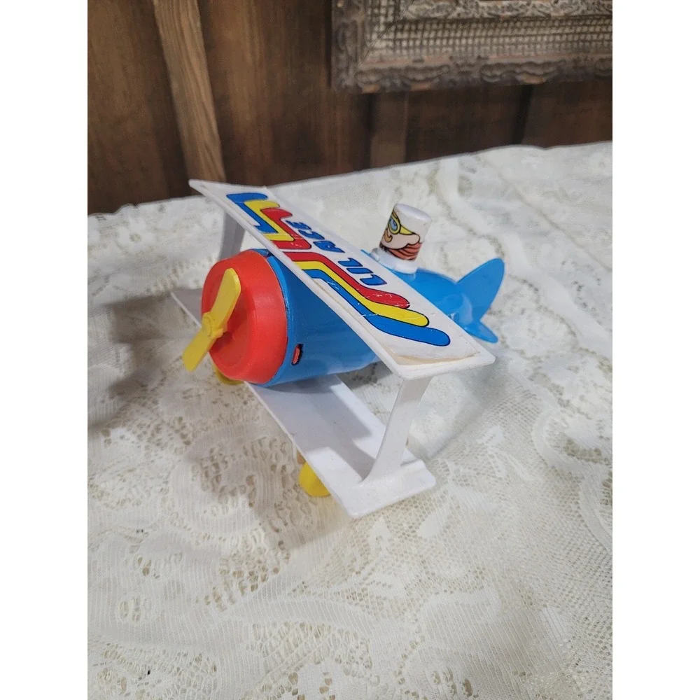 LIL ACE plastic airplane toy 1970s psychedelic stunt biplane w/ mustache man